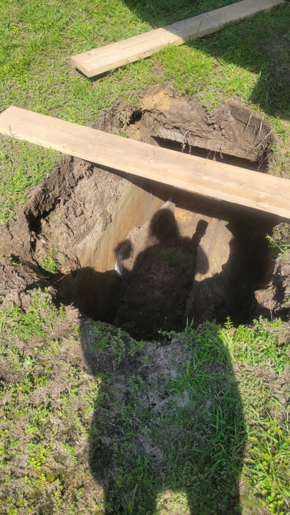 This is the hole that Doug found at his best friend's house when trying to back in the camper.