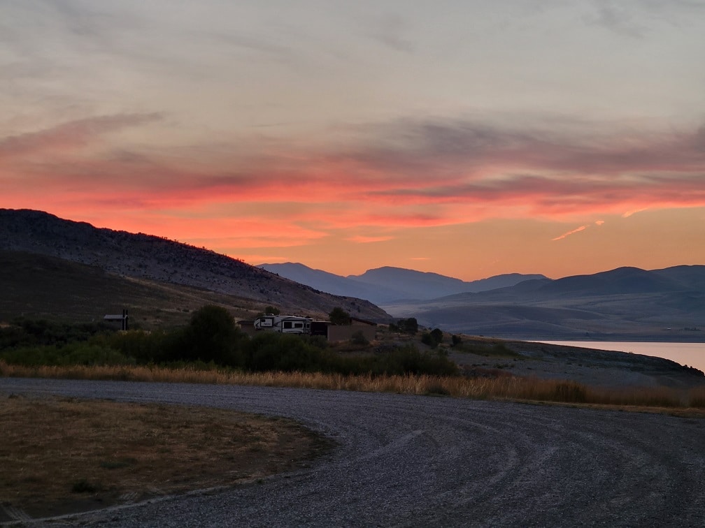 Sunrise over the mountains from Doug and Loretta's (of Interstate Adventures) campsite at Horse Prairie Campground in the Clark Canyon Reservoir in Montana.