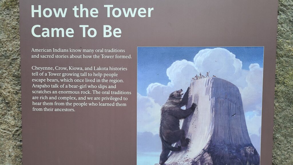 Sign at Devils Tower depicting the Native American legends of how the tower was created.